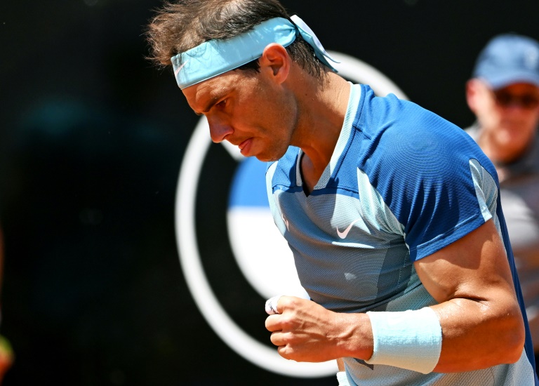 Nadal eases past Isner into Rome last 16