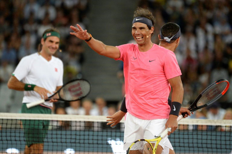 Federer, Nadal play to record crowd in Cape Town