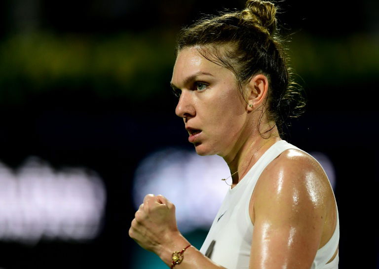 Halep beats Mertens to win WTA Prague Open