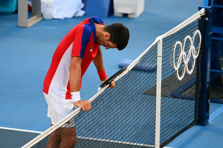 JO-2020 - Djokovic repart bredouille, et blessé, de Tokyo