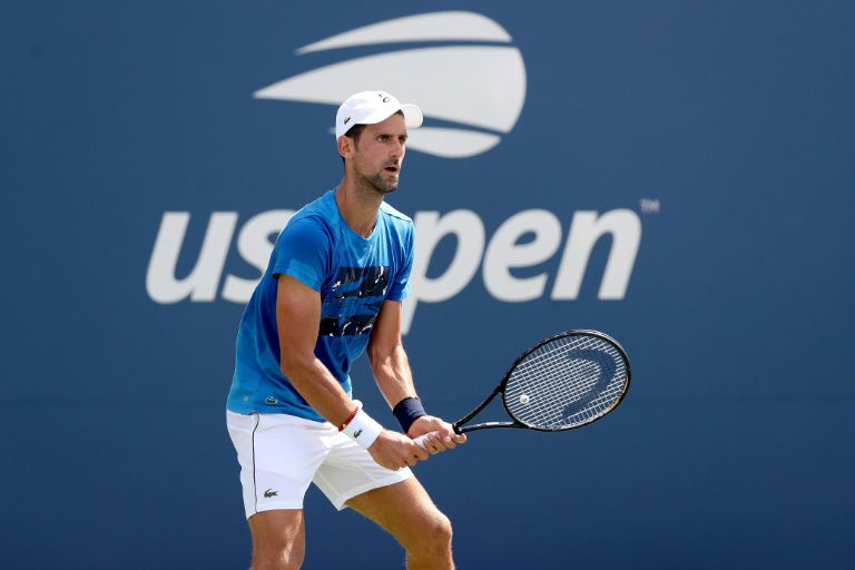 Djokovic motivated by talk of catching Federer in Slams