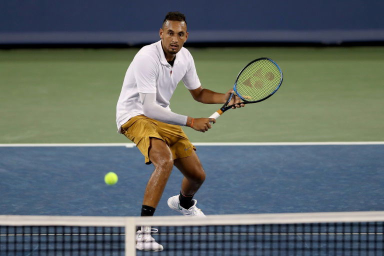 Fiery Kyrgios smashes racquets, tosses shoes in loss