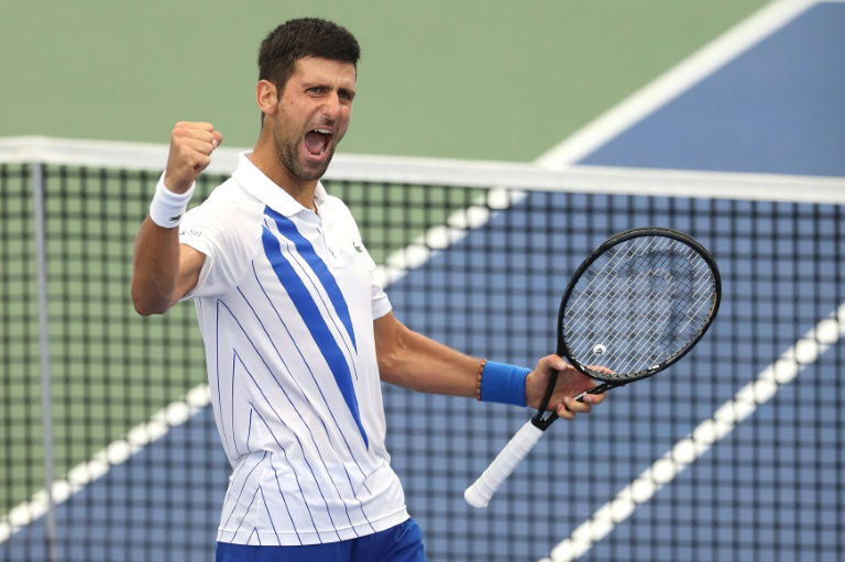 Djokovic rallies past Raonic to win US Open tuneup title