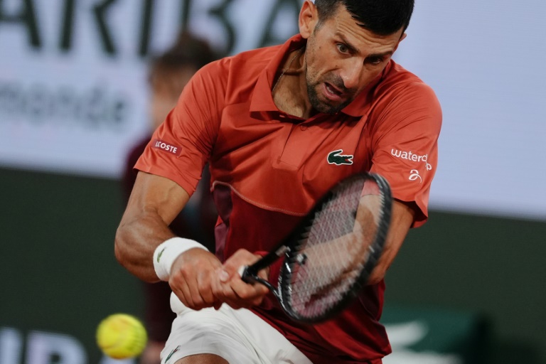 Djokovic untroubled at French Open as fans hit by alcohol ban