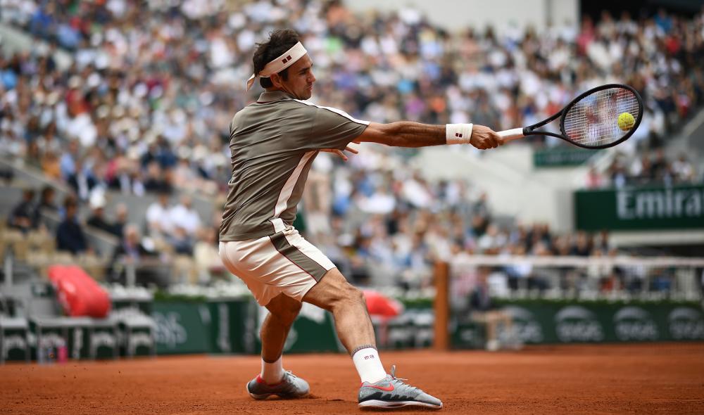 Federer vire en tête face à Wawrinka 