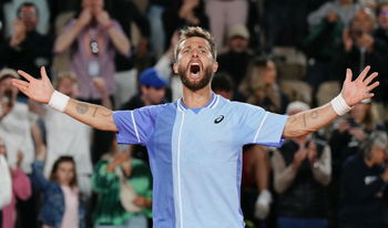 Moutet in the last eight without playing!
