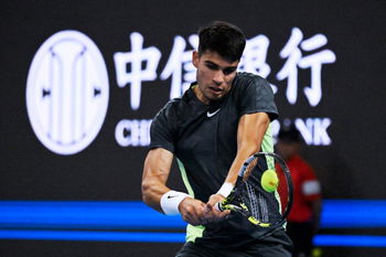 Alcaraz masters Ruud to reach the last four in Beijing.
