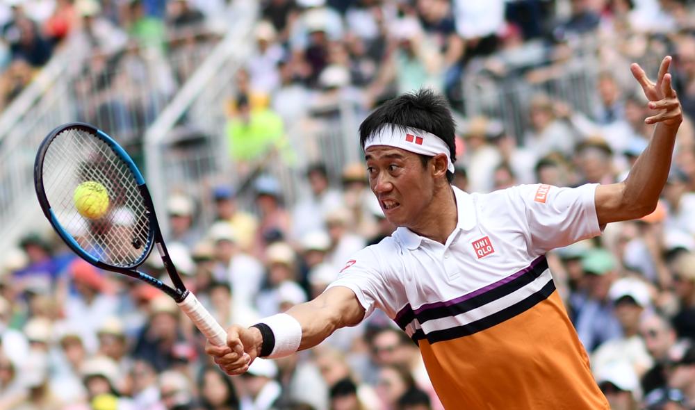 Nishikori vire en tête avant l'interruption face à Paire